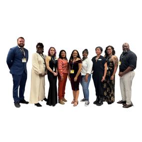 The CAB members standing together against a white background.