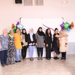 Group of people posing for a picture.